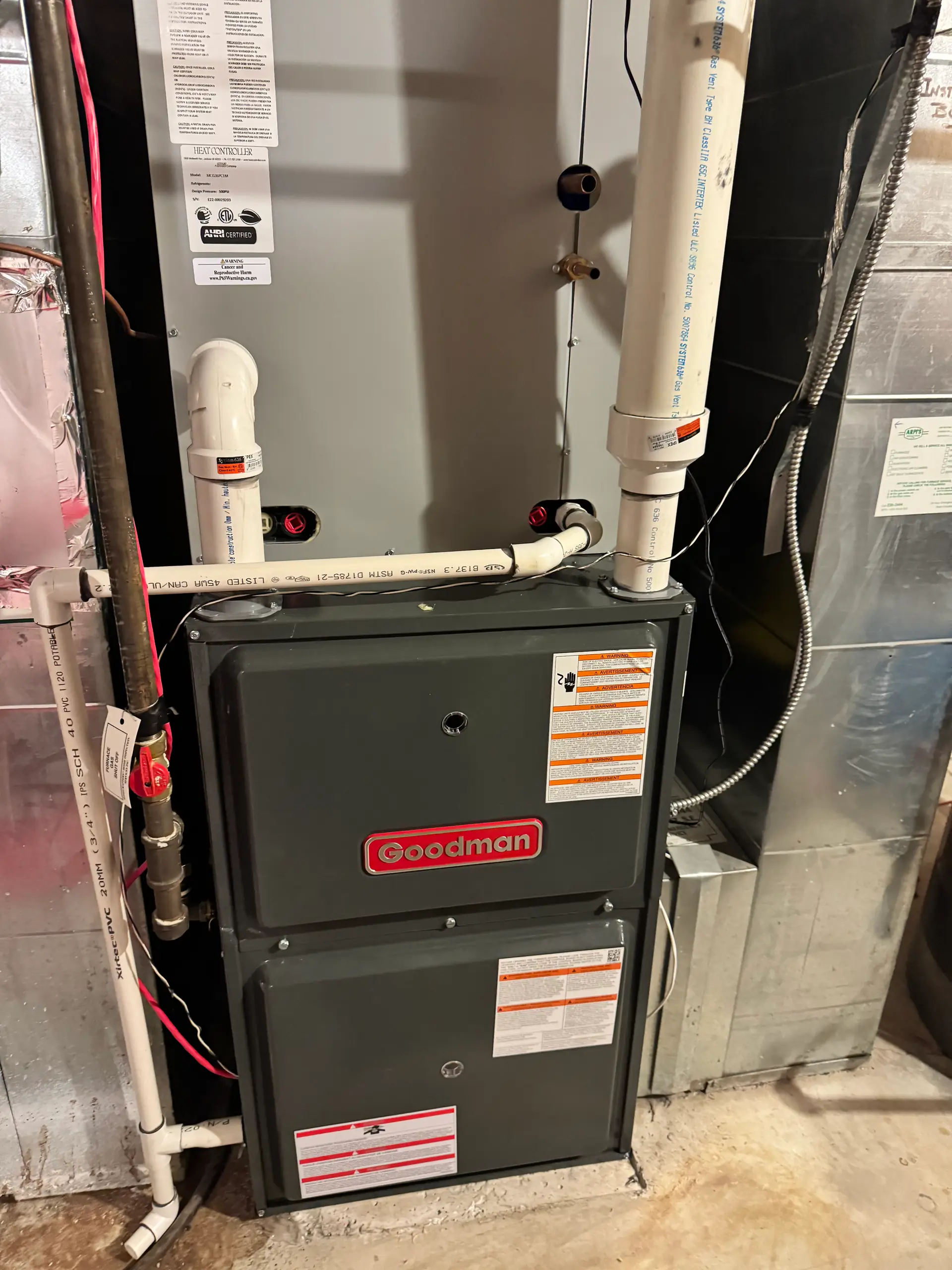 High-efficiency Goodman gas furnace installed by Wagner Mechanical in a Calgary basement
